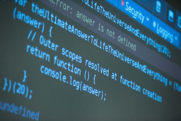 java program code on projector screen at programming class